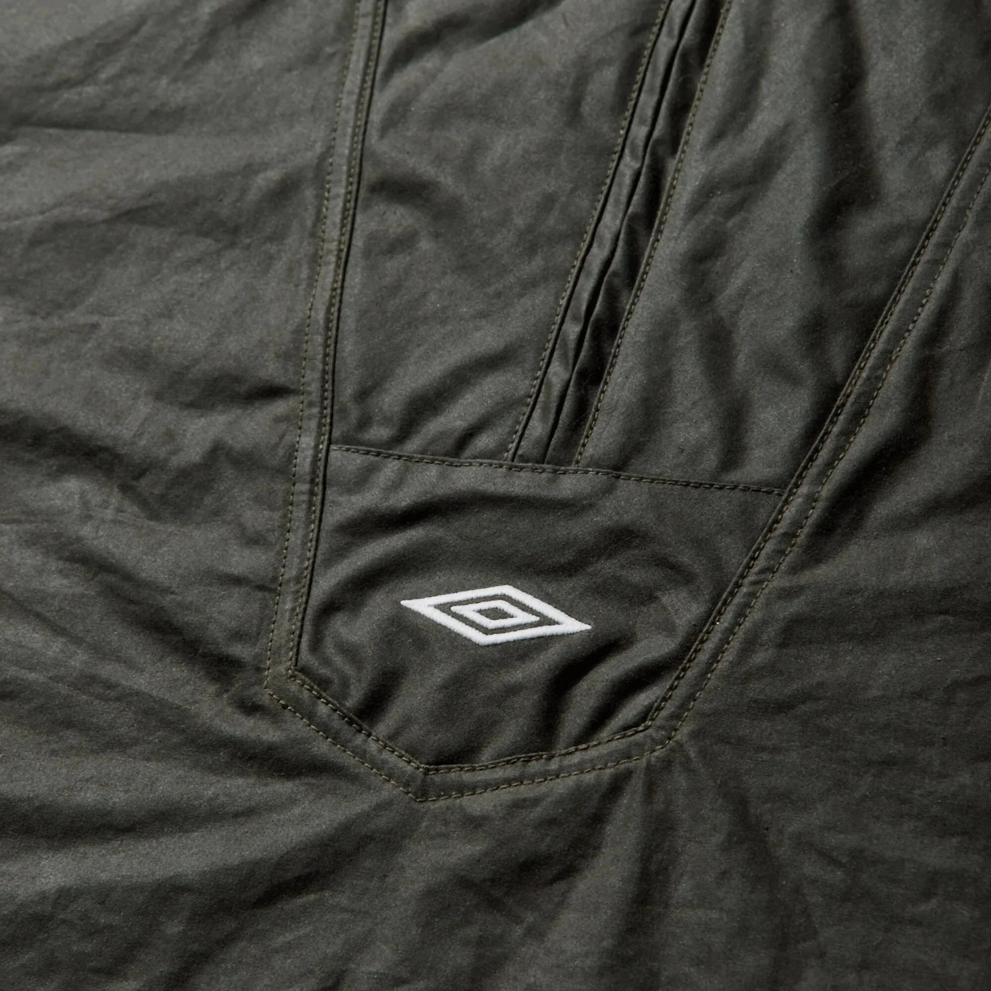 Umbro By Slam Jam Masked Waxed Anorak - Dark Olive