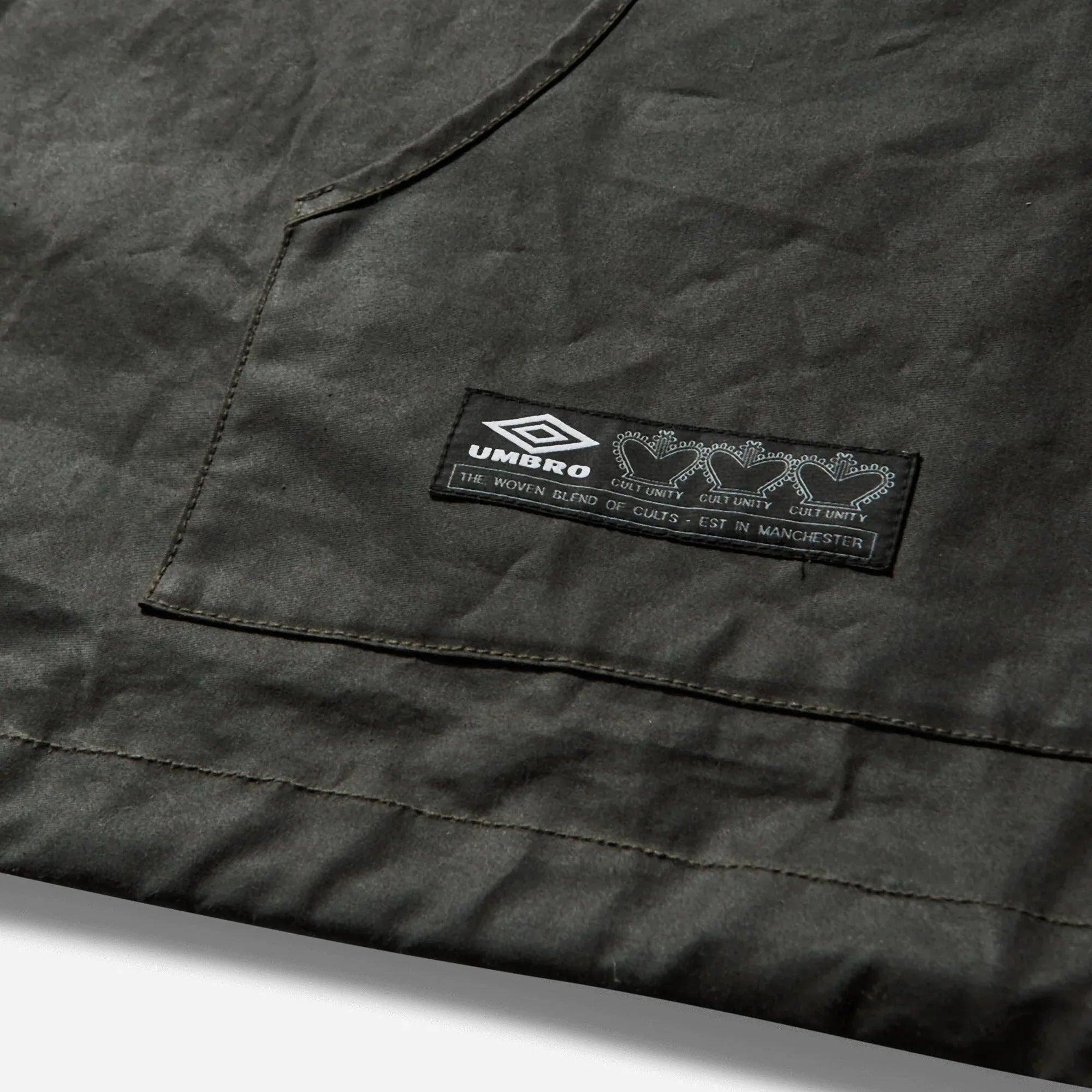 Umbro By Slam Jam Masked Waxed Anorak - Dark Olive