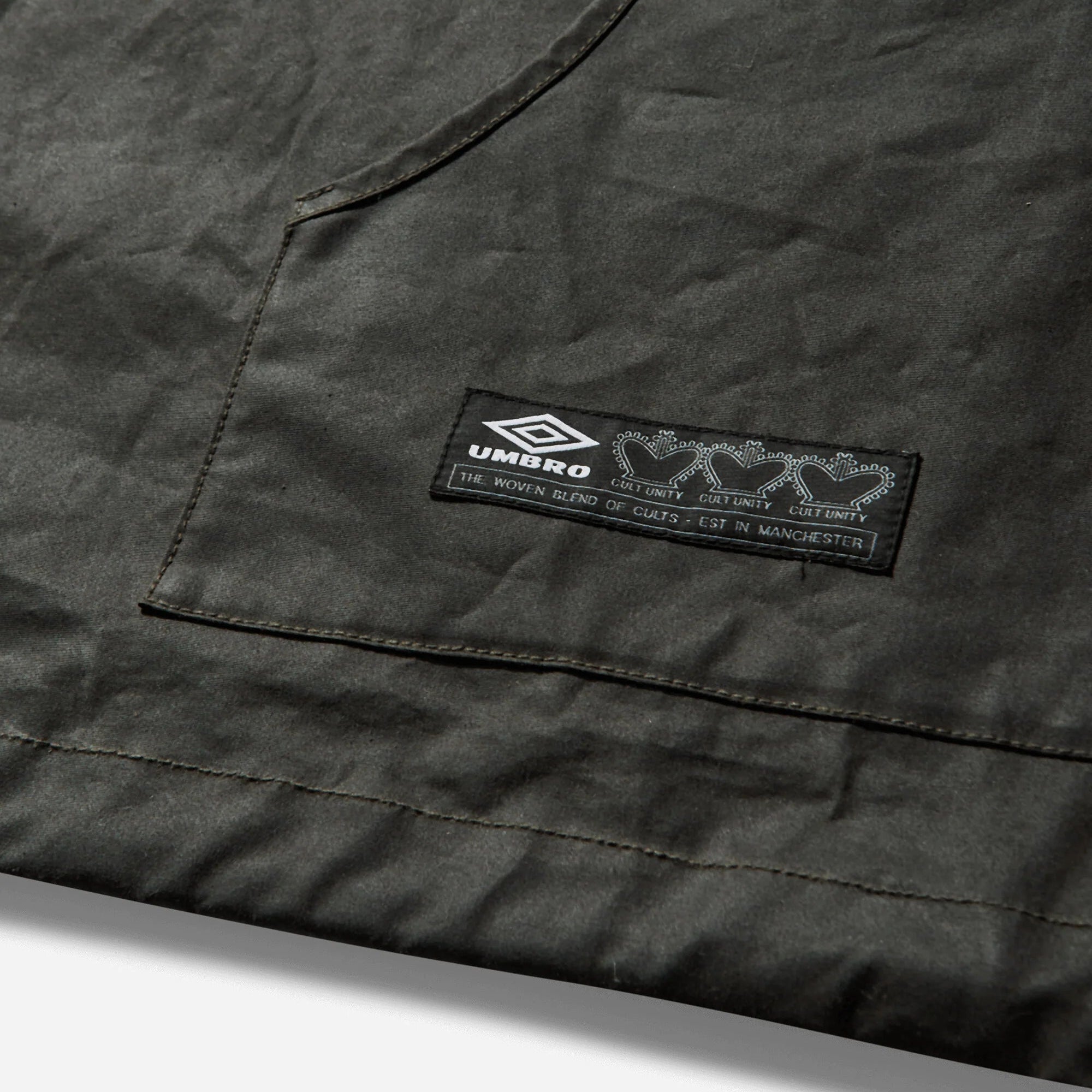 Umbro By Slam Jam Masked Waxed Anorak - Dark Olive